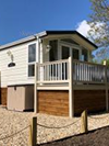 low angle of caravan with decking